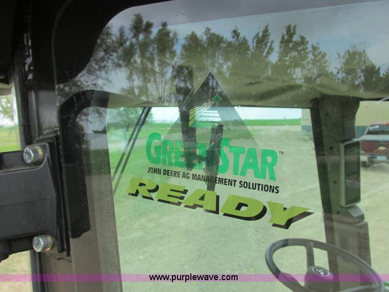 image for item I2543 2013 John Deere R450 SP self-propelled windrower