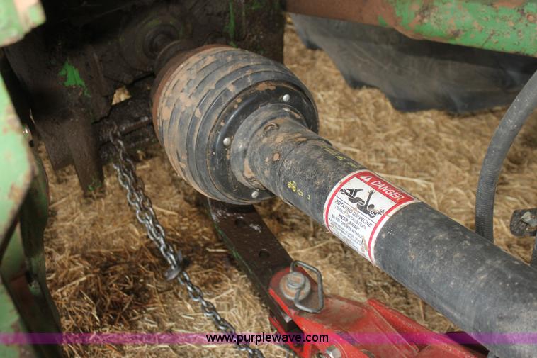 image for item I7335 2003 New Holland BR780 round baler