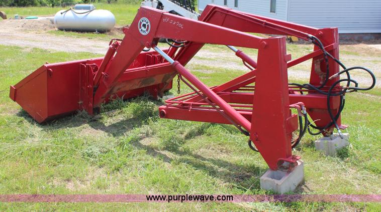 image for item J1116 Bush Hog loader