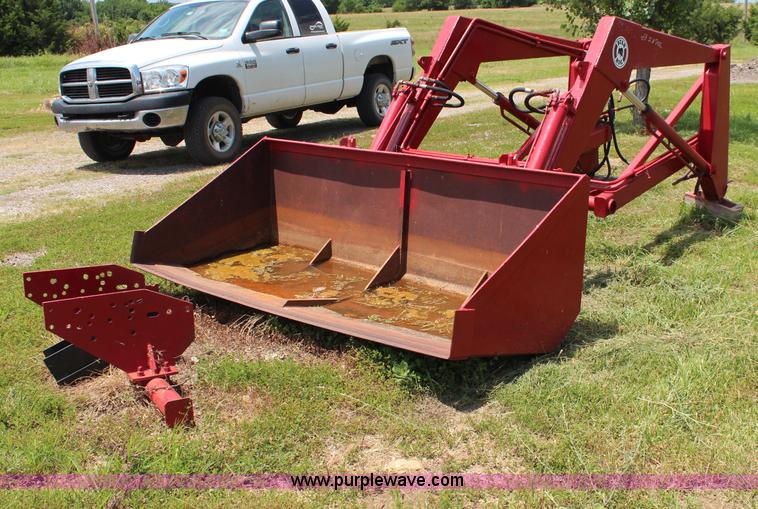 image for item J1116 Bush Hog loader