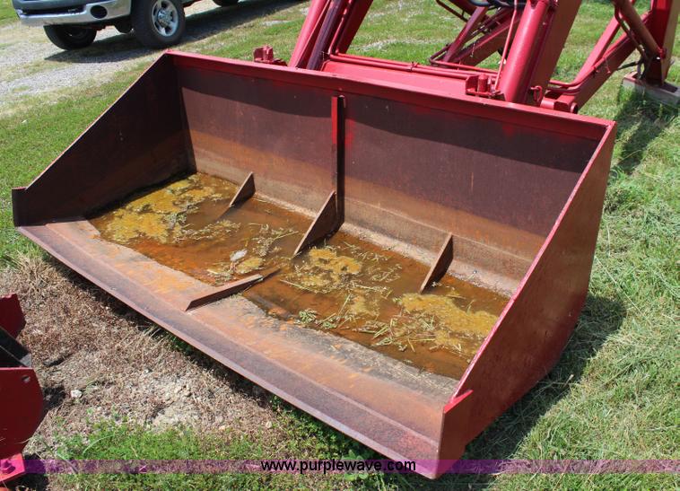 image for item J1116 Bush Hog loader