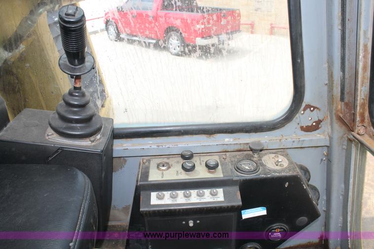 image for item C3884 1994 Gradall XL4100 rubber tire excavator