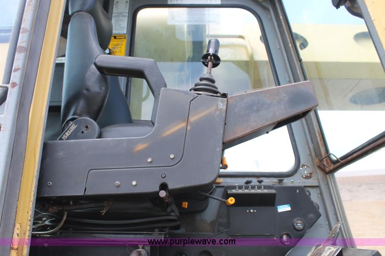 image for item C3884 1994 Gradall XL4100 rubber tire excavator