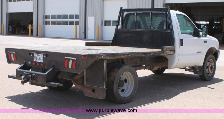 image for item C3886 1999 Ford F550 Super Duty flatbed truck