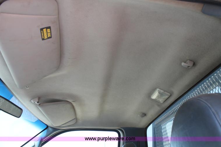 image for item C3886 1999 Ford F550 Super Duty flatbed truck