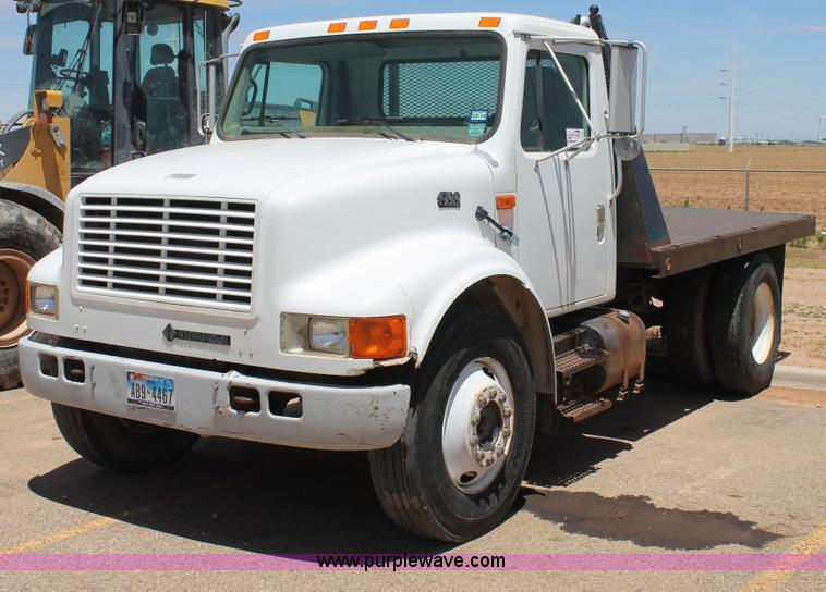 image for item C3887 1997 International 4700 flatbed truck