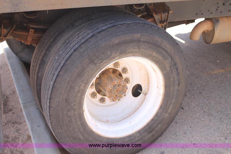 image for item C3887 1997 International 4700 flatbed truck