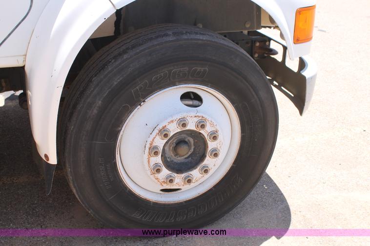 image for item C3887 1997 International 4700 flatbed truck