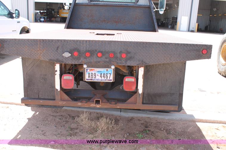 image for item C3887 1997 International 4700 flatbed truck