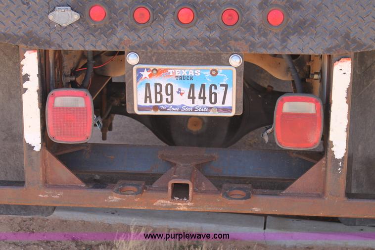 image for item C3887 1997 International 4700 flatbed truck