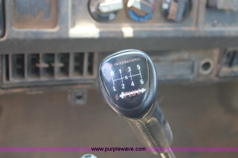 image for item C3887 1997 International 4700 flatbed truck