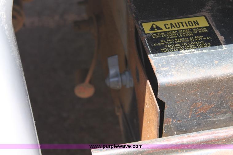image for item C3887 1997 International 4700 flatbed truck