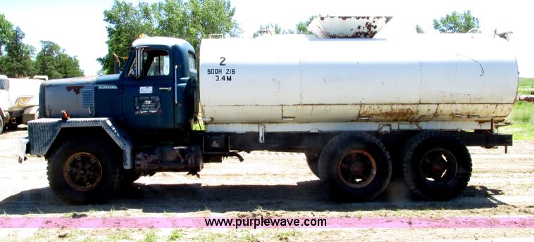 image for item F7415 1965 International M623CBE water truck