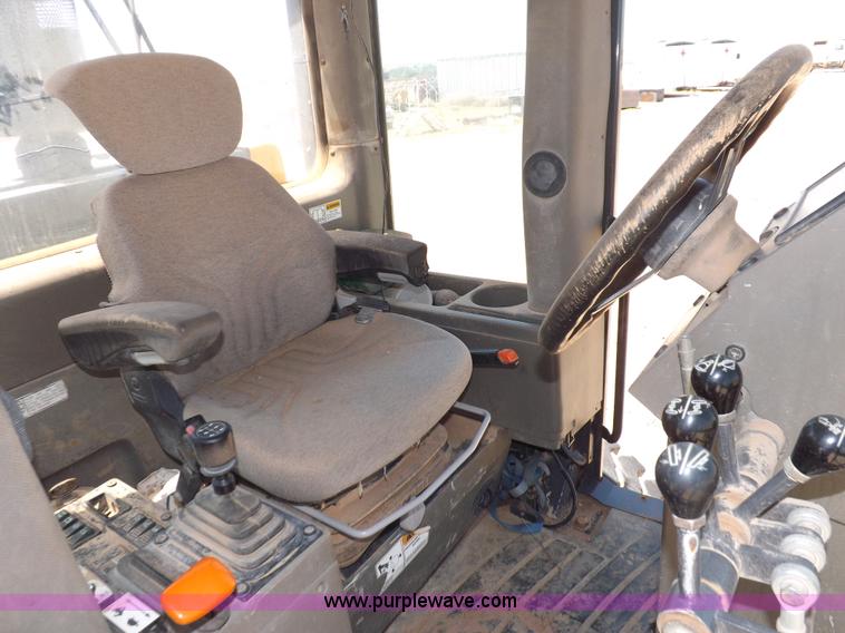 image for item H1799 2004 Case 865 DHP articulated motor grader