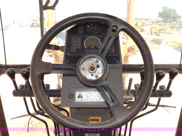 image for item H1799 2004 Case 865 DHP articulated motor grader