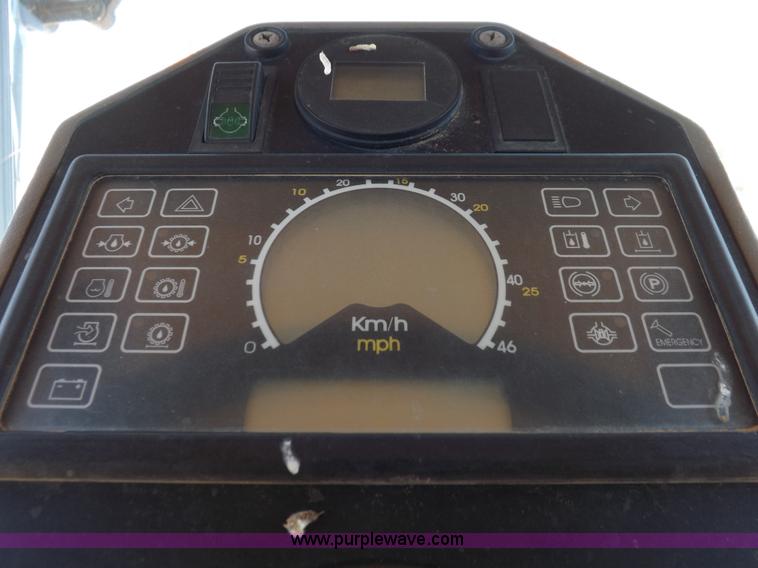 image for item H1799 2004 Case 865 DHP articulated motor grader