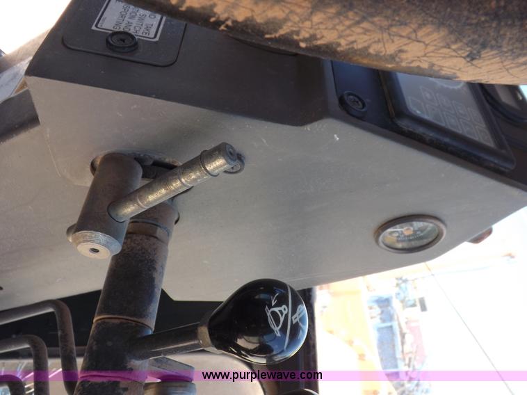 image for item H1799 2004 Case 865 DHP articulated motor grader