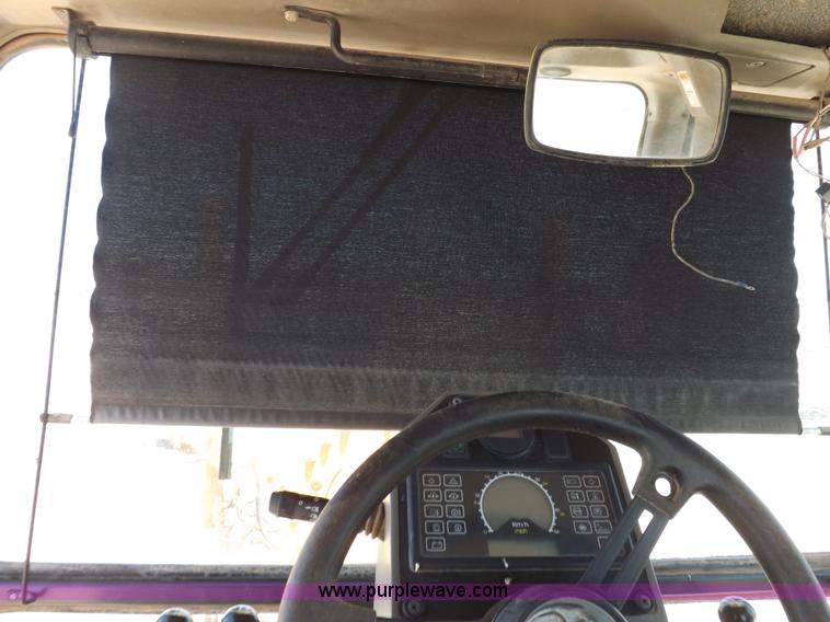 image for item H1799 2004 Case 865 DHP articulated motor grader