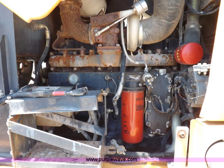 image for item H1799 2004 Case 865 DHP articulated motor grader