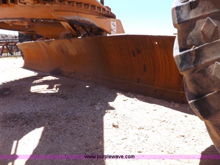 image for item H1799 2004 Case 865 DHP articulated motor grader