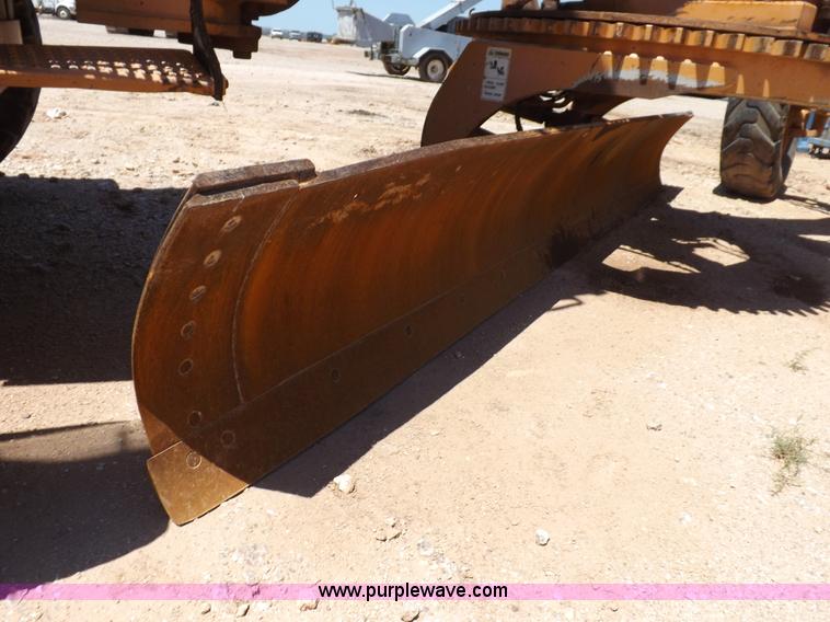 image for item H1799 2004 Case 865 DHP articulated motor grader