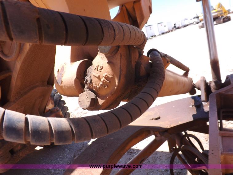 image for item H1799 2004 Case 865 DHP articulated motor grader