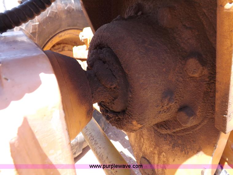 image for item H1799 2004 Case 865 DHP articulated motor grader