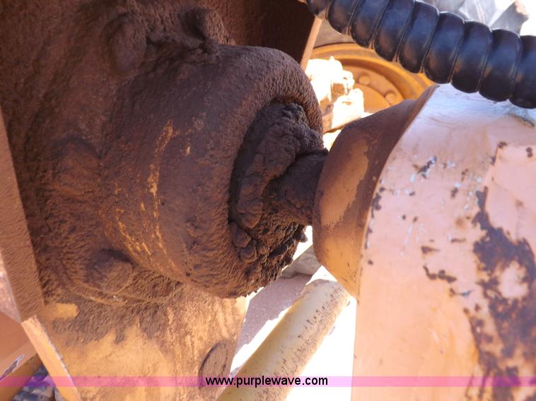 image for item H1799 2004 Case 865 DHP articulated motor grader