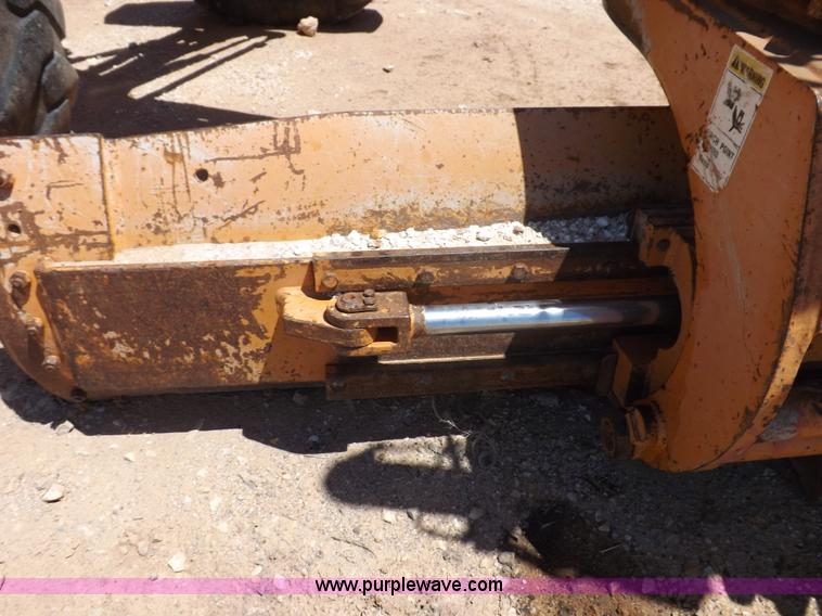 image for item H1799 2004 Case 865 DHP articulated motor grader