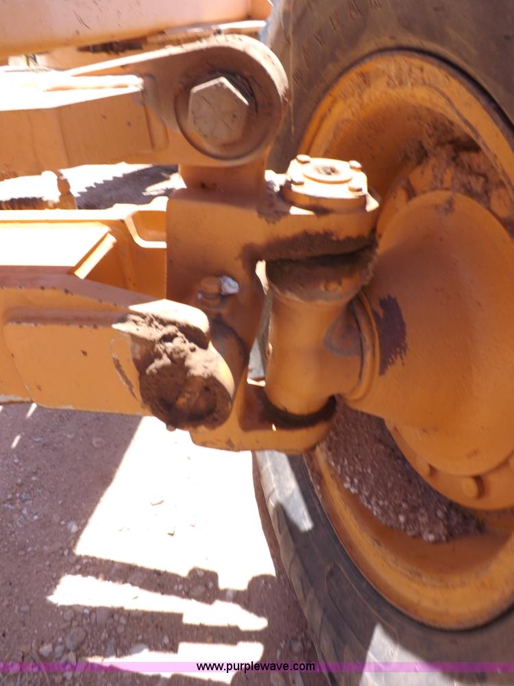 image for item H1799 2004 Case 865 DHP articulated motor grader