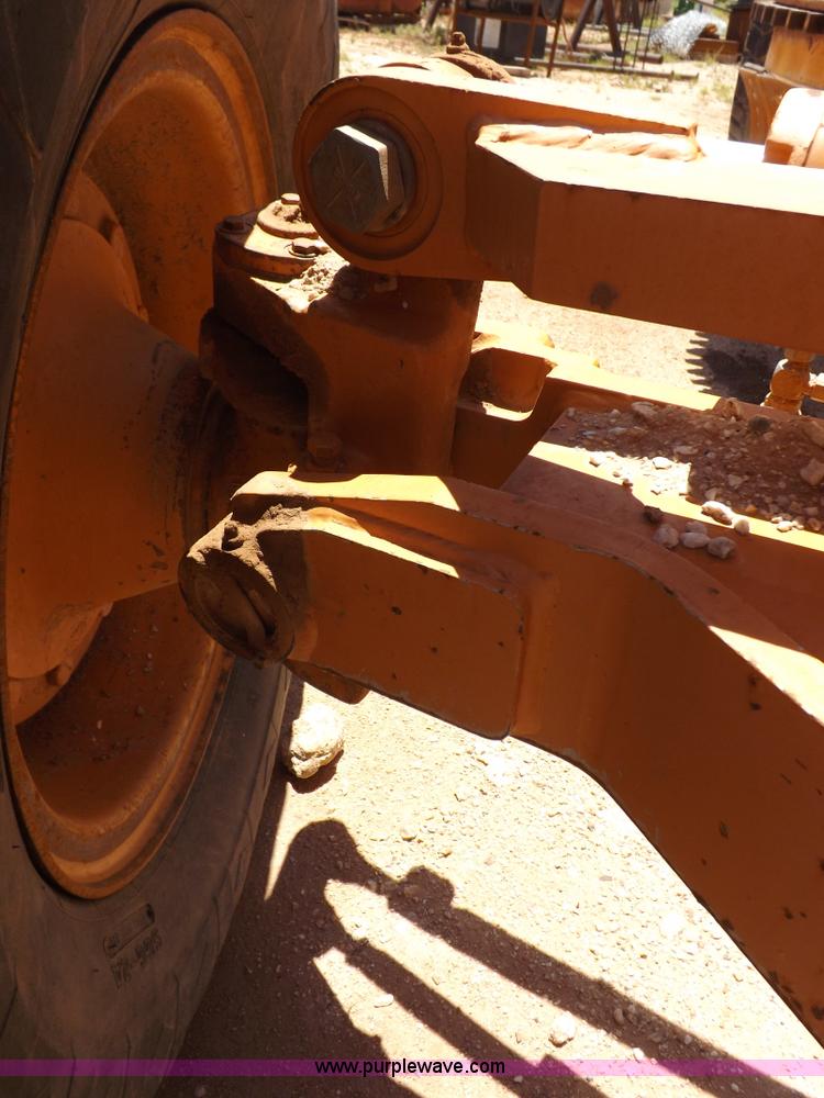 image for item H1799 2004 Case 865 DHP articulated motor grader