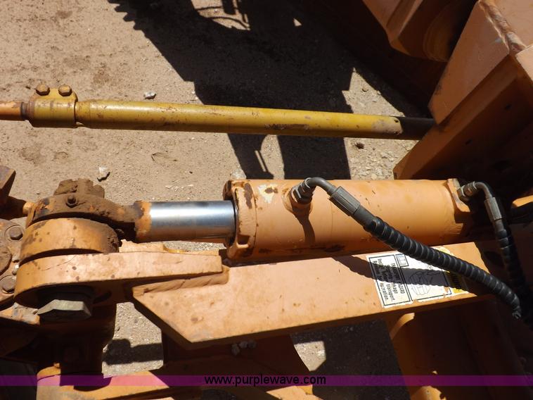 image for item H1799 2004 Case 865 DHP articulated motor grader