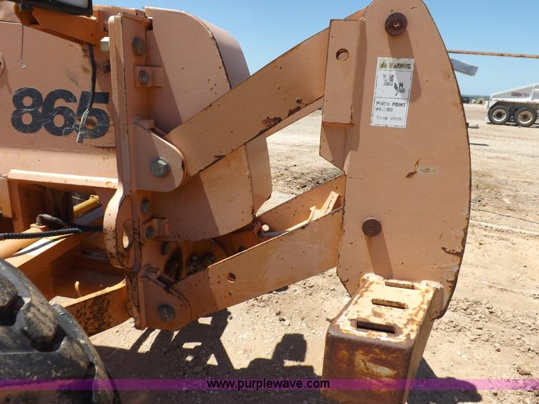 image for item H1799 2004 Case 865 DHP articulated motor grader