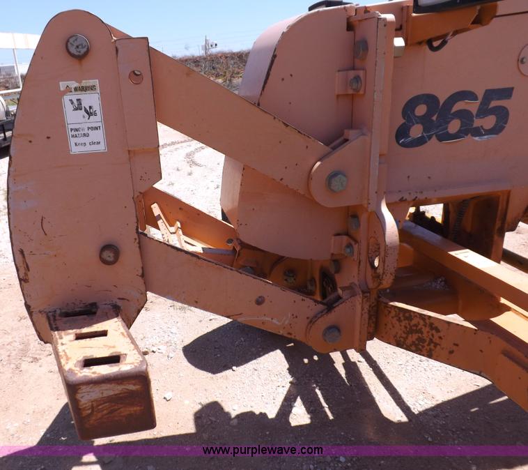 image for item H1799 2004 Case 865 DHP articulated motor grader