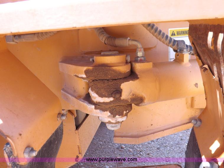 image for item H1799 2004 Case 865 DHP articulated motor grader