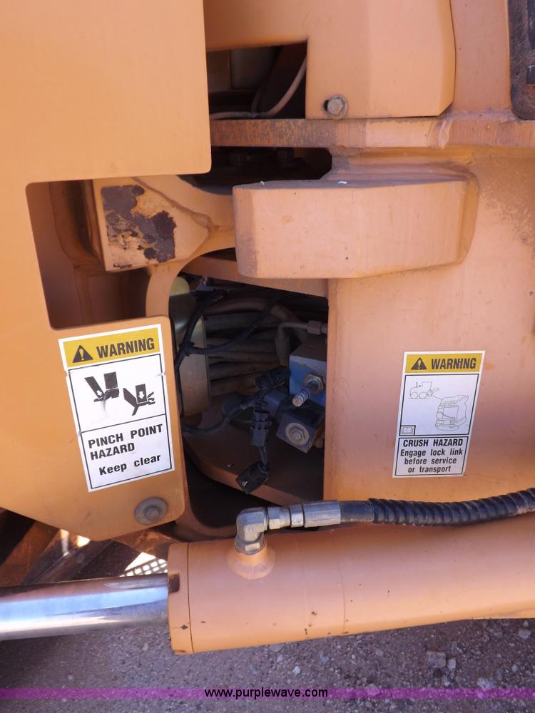 image for item H1799 2004 Case 865 DHP articulated motor grader