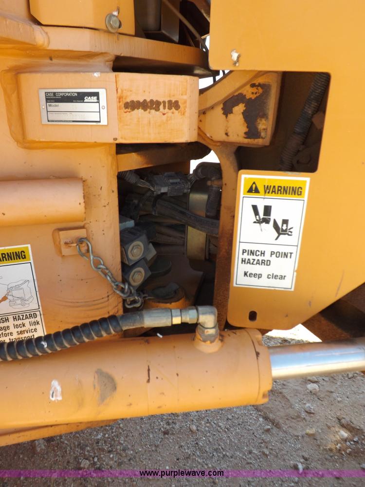 image for item H1799 2004 Case 865 DHP articulated motor grader