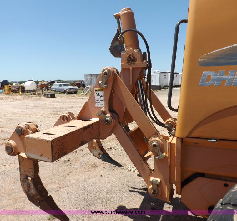 image for item H1799 2004 Case 865 DHP articulated motor grader