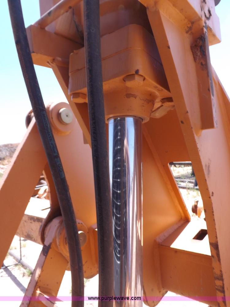 image for item H1799 2004 Case 865 DHP articulated motor grader