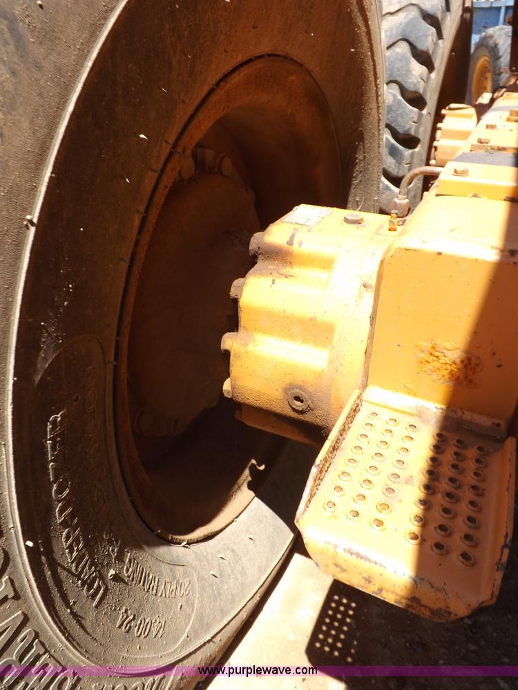 image for item H1799 2004 Case 865 DHP articulated motor grader