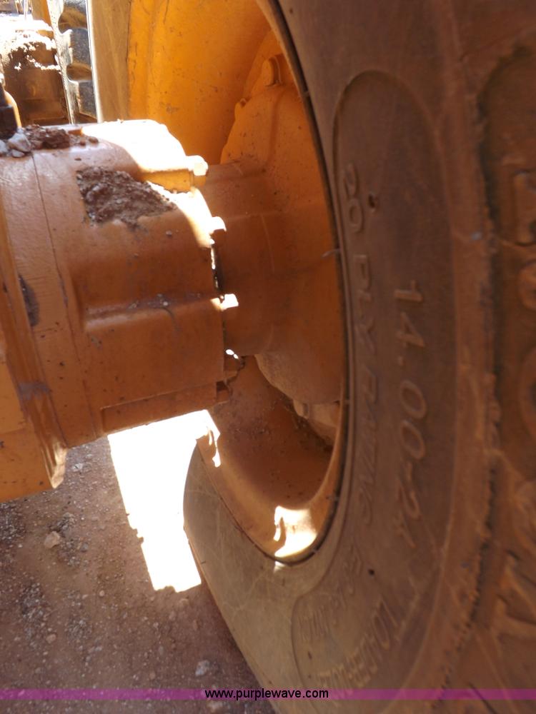 image for item H1799 2004 Case 865 DHP articulated motor grader