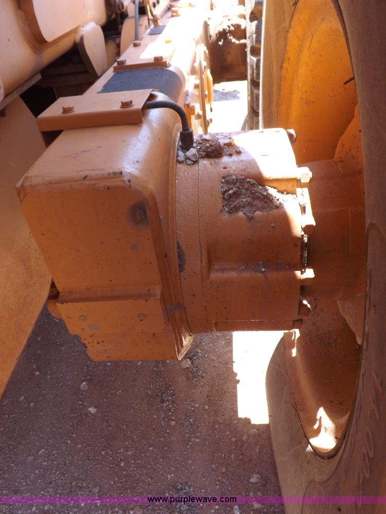 image for item H1799 2004 Case 865 DHP articulated motor grader