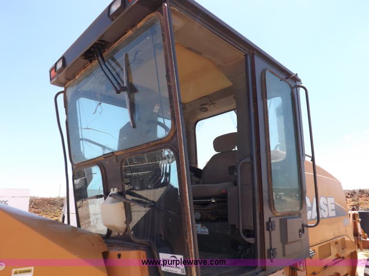 image for item H1799 2004 Case 865 DHP articulated motor grader