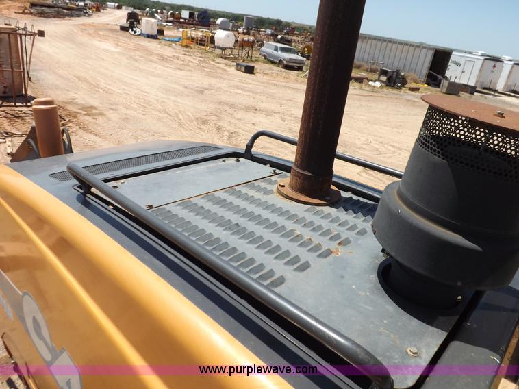 image for item H1799 2004 Case 865 DHP articulated motor grader