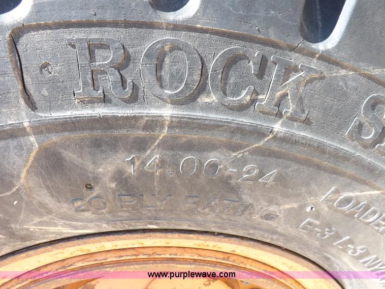 image for item H1799 2004 Case 865 DHP articulated motor grader