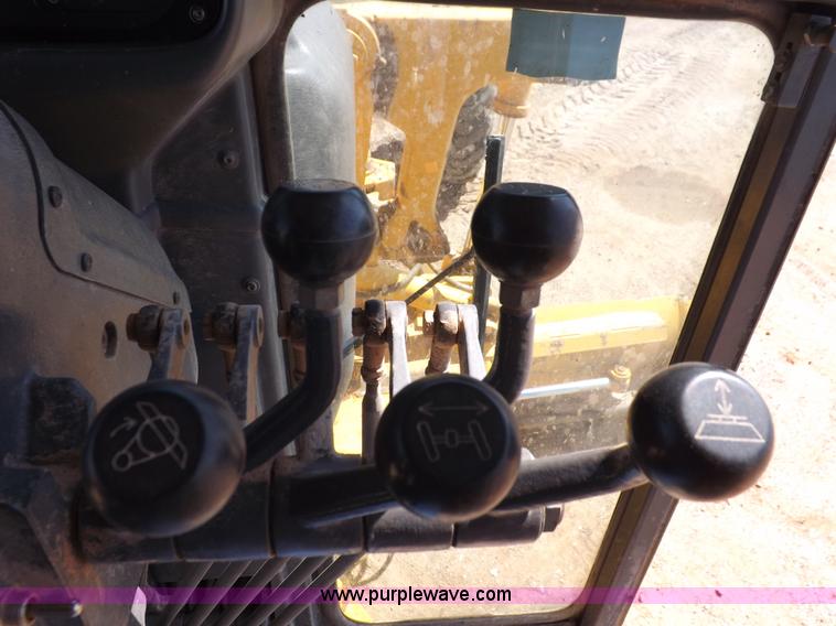 image for item H1801 2003 Volvo G720B articulated motor grader