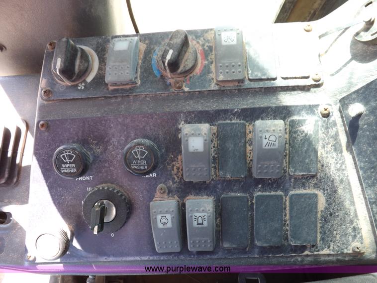 image for item H1801 2003 Volvo G720B articulated motor grader