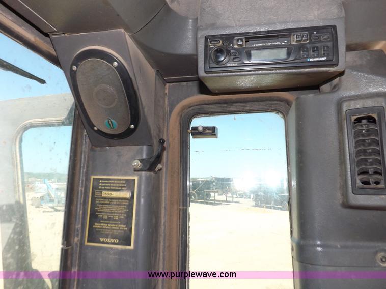 image for item H1801 2003 Volvo G720B articulated motor grader