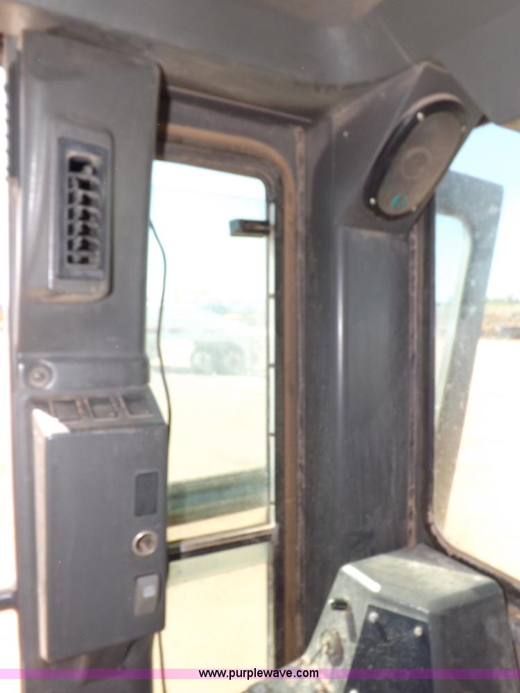 image for item H1801 2003 Volvo G720B articulated motor grader