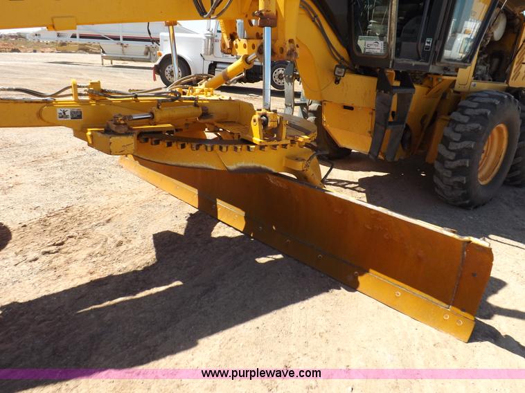 image for item H1801 2003 Volvo G720B articulated motor grader